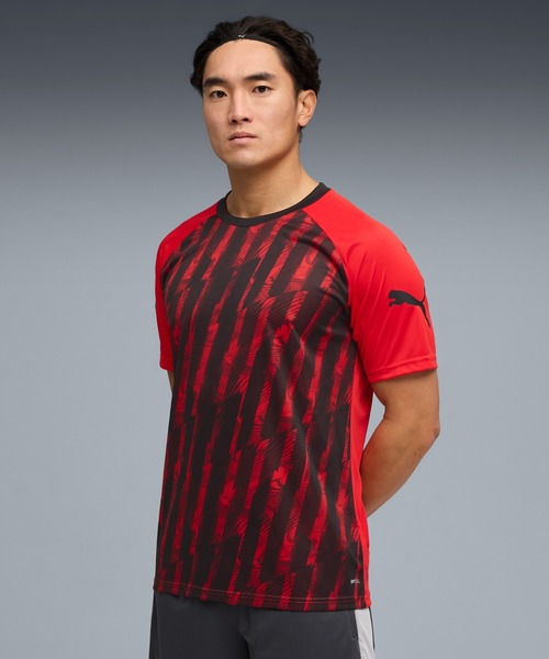 PUMA(プーマ)の「PUMA プーマ メンズ サッカー INDIVILIGA グラフィック 半袖 シャツ(Tシャツ/カットソー・メンズ・ブラック系その他5/ブラック/ブラック系その他6・X-LARGE/LARGE/MEDIUM/SMALL/XX-LARGE)」の1枚目の写真