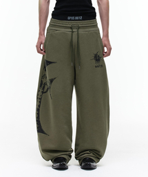 OPUS 0012（オーパス0012）の「Op. 08 CROSS CURVED SWEAT PANTS KHAKI（その他パンツ）」