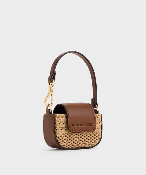 CHARLES & KEITH（チャールズ & キース）の「Ida アイダ ニット マイクロポーチ（ポーチ・レディース・ベージュ・XXS）」の2枚目の写真