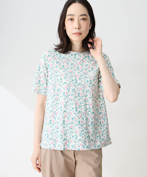 DECOY SINCE 1981(デコイシンスイチキュウハチイチ)の「【in Bloomコラボ】ひやさら総柄Tシャツ【接触冷感・UVカット・オーガニックコットンブレンド】(Tシャツ/カットソー・レディース・グリーン/オレンジ・L/LL/M)」の2枚目の写真