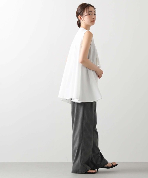 Torrazzo Donna（トラッゾドンナ）の「フロントリボンＡラインフレアチュニック（シャツ/ブラウス・レディース・オフホワイト/ブラック・FREE）」の4枚目の写真