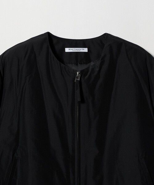 BEAUTY&YOUTH UNITED ARROWS(ビューティーアンドユースユナイテッドアローズ)の「ポリエステルブレンド ノーカラーバルーンジップブルゾン(ブルゾン・レディース・ブラック/オフホワイト/モカ・M/S)」の8枚目の写真