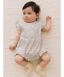 JAMIE KAY（ジェイミーケイ）の「フリルロンパースTully Grey / オーガニックコットン（ロンパース）」