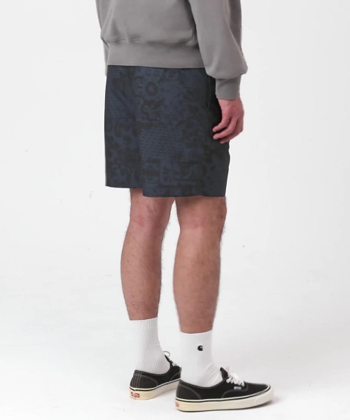 Carhartt WIP(カーハートダブリューアイピー)の「Carhartt WIP SLATER SWIM TRUNKS(カーハートワークインプログレス スレーター スイム トランクス)(その他パンツ・メンズ・カモフラージュ/ネイビー系・X-SMALL/X-LARGE/LARGE/MEDIUM/SMALL)」の1枚目の写真