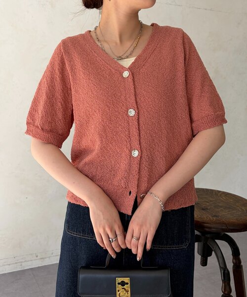 Chez toi(シェトワ)の「ニュアンスボタン5分袖ニットプルオーバー(カーディガン/ボレロ・レディース・オレンジ/ネイビー・FREE)」の2枚目の写真