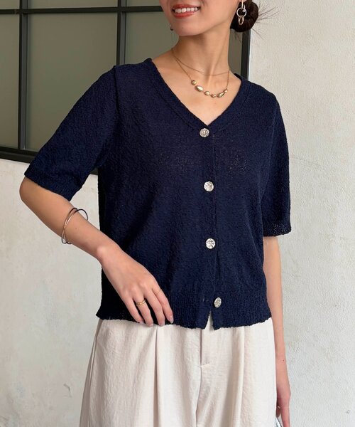 Chez toi(シェトワ)の「ニュアンスボタン5分袖ニットプルオーバー(カーディガン/ボレロ・レディース・オレンジ/ネイビー・FREE)」の9枚目の写真