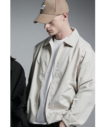 APOSTROPHE COMMA（アポストロフィコンマ）の「カラーブルゾンウィンドブレーカージップアップジャケット（アイボリー）（MA-1）」