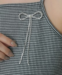 Monocoro toppi（モノコロトッピ）の「ユラユラ ビジュー リボンブローチ　パール付き（ブローチ/コサージュ）」