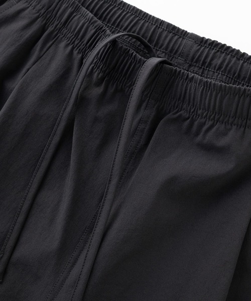 THOUSAND MILE(サウザンドマイル)の「THOUSAND MILE/サウザンドマイル SHORT SLEEVE T-SHIRT & LONG PANTS SET ストレッチ性 UVカット セットアップ 2026年春夏(セットアップ・メンズ・ブラック/チャコール・XS/M/L/XL)」の6枚目の写真