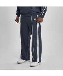 TOLANCE（トランス）の「ストレートワイドパイピングパンツ - インクネイビー（スウェットパンツ）」