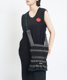 gomme（ゴム）の「シュリンクボーダーバッグ（トートバッグ）」