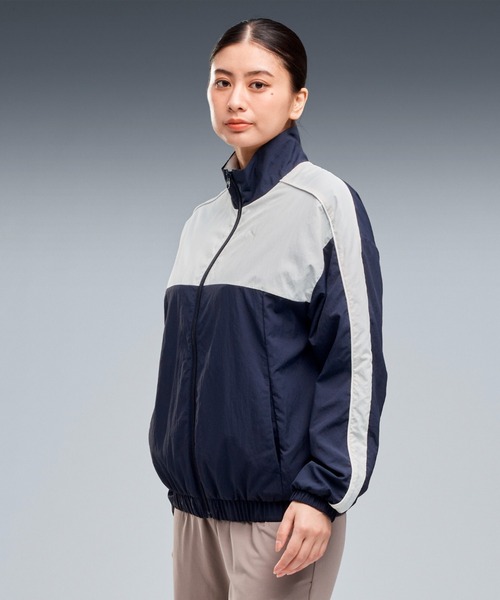 PUMA(プーマ)の「PUMA プーマ ウィメンズ トレーニング TAD ウーブン ブラッシュド ライニン(ブルゾン・レディース・ブラック/ネイビー・X-LARGE/SMALL/MEDIUM/LARGE)」の1枚目の写真