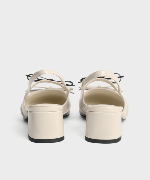 CHARLES & KEITH(チャールズ & キース)の「Dorri ドリー ダブルボウスリングバックパンプス(パンプス・レディース・ブラック系その他6/オフホワイト・22.5cm/25cm/24.5cm/23.5cm/23cm)」の8枚目の写真
