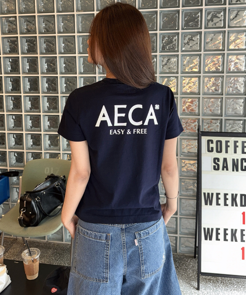 AECA(エイカ)の「AECA SIGNATURE TEE-NAVY(Tシャツ/カットソー・レディース・その他・MEDIUM/LARGE/X-LARGE/W)」の7枚目の写真