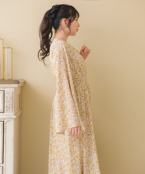 イエロー フレアスリーブ ワンピース M ems excite（エムズエキサイト）の「フレアスリーブフラワーOP