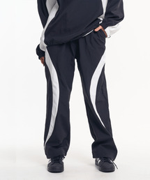 MOO（エムオーオー）の「ナイロンサイドカーブトラックパンツ - ブラック（スウェットパンツ）」