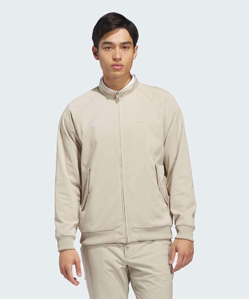 adidas(アディダス)の「ウーブン スイングトップ ジャケット【adidas Golf/アディダスゴルフ】(ブルゾン・メンズ・ベージュ・X-LARGE/SMALL/MEDIUM/LARGE/XX-LARGE)」の1枚目の写真