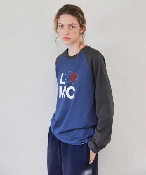 LMCの「WM TYPO HEART COLOR BLOCK RAGLAN LONG SLV TEE vintage blue(Tシャツ/カットソー・レディース・その他・SMALL/MEDIUM)」の1枚目の写真