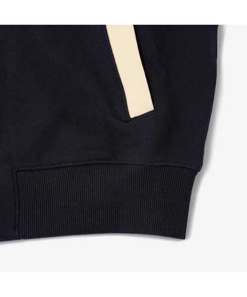 TOMMY HILFIGER(トミーヒルフィガー)の「KIDS ユニバーシティボンバージャケット(スタジャン・キッズ・ネイビー・150cm/160cm/130cm/140cm)」の8枚目の写真