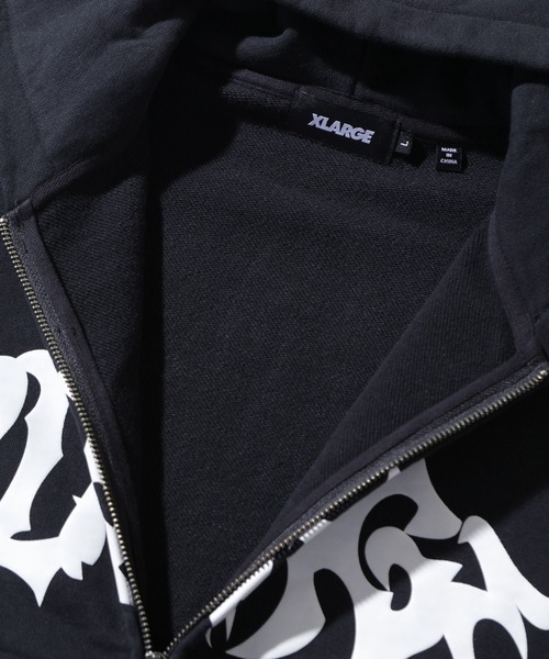 XLARGE（エクストララージ）の「DISTORTED LOGO ZIP UP HOODED