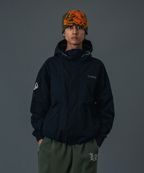XLARGE(エクストララージ)の「NYLON HOODED JACKET(ナイロンジャケット・メンズ・ブラック/カーキ/パープル・S/M/L/XL)」の2枚目の写真