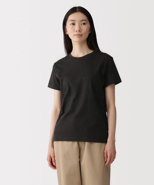 無印良品(ムジルシリョウヒン)の「婦人 天竺編みクルーネック半袖Tシャツ(Tシャツ/カットソー・レディース・ブラック/ライトオレンジ系/グレー/ブルー系/ブラック系/オレンジ系/ブラック系1/ホワイト・S/M/L/XL)」の1枚目の写真