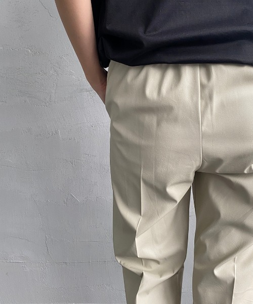 USINE（ユジーヌ）の「[USINE/ユジーヌ] フェイクレザー セミフレアセンタープレスパンツ（その他パンツ・レディース・ブラック/アイボリー・36）」の18枚目の写真