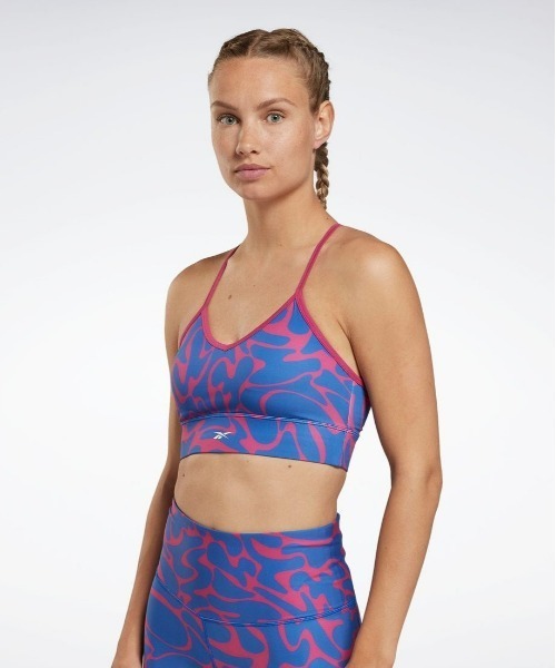Reebok（リーボック）の「ワークアウト トライ バック ブラ / WOR AOP Tri Back Bra【返品不可商品】（スポーツブラ・レディース・ピンク/ブラック・J/S/J/M/J/L/OT）」の2枚目の写真