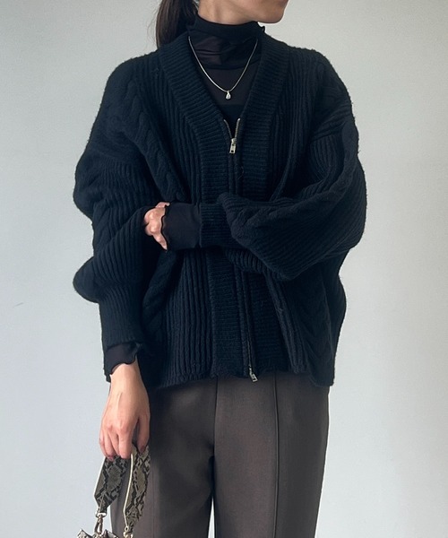 un dix cors（アンディコール）の「ケーブルジップカーディガン