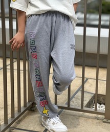 Mark Gonzales（マーク・ゴンザレス）の「MARK GONZALES ART WORK/マークゴンザレス【web限定】マルチカラー発泡ロゴスウェットパンツ（スウェットパンツ）」