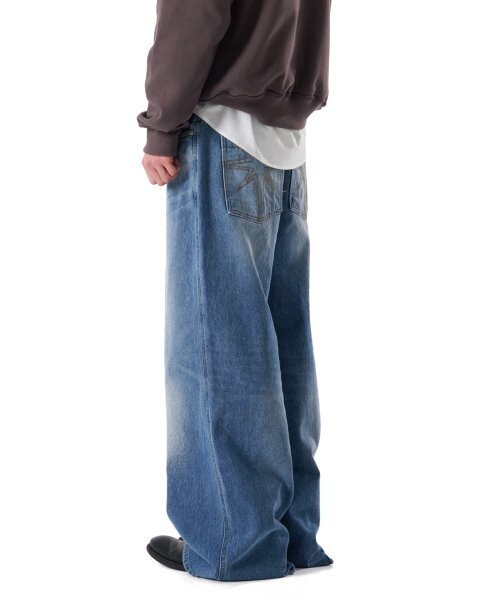 IUGAMAKARAS（イウガマカラス）の「Needlework Denim Pants (Blue 