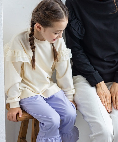 lulpini（ルルピー二）の「kids ポンチフリルドッキングプルオーバー（パーカー・キッズ・アイボリー/ブラック/ブルー・S/M/L）」の2枚目の写真