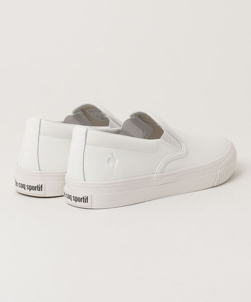 le coq sportif(ルコックスポルティフ)の「le coq sportif LE BLANC / ルコックスポルティフ LE ブラン(スリッポン・レディース・ホワイト/ブラック・22.5cm)」の4枚目の写真