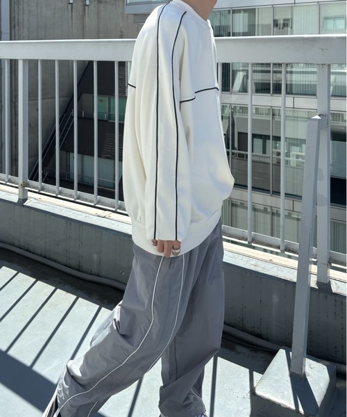 CREARE -LINO-(クレアーレリノ)の「<ユニセックス>ダンボール オーバーサイズ ライン トラック プロオーバー(スウェット・メンズ・ブラック/オフホワイト/ネイビー・M/L)」の12枚目の写真