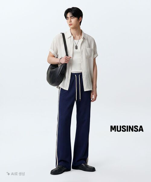 MUSINSA STANDARD（ムシンサスタンダード）の「シンセティックレザー ホーボーメッセンジャーバッグ [ブラック]（メッセンジャーバッグ・レディース・その他・FREE）」の10枚目の写真