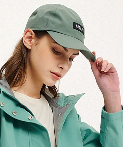 AIGLE(エーグル)の「ゴアテックス ロゴキャップ(キャップ・レディース・ブラック/グリーン・FREE)」の1枚目の写真