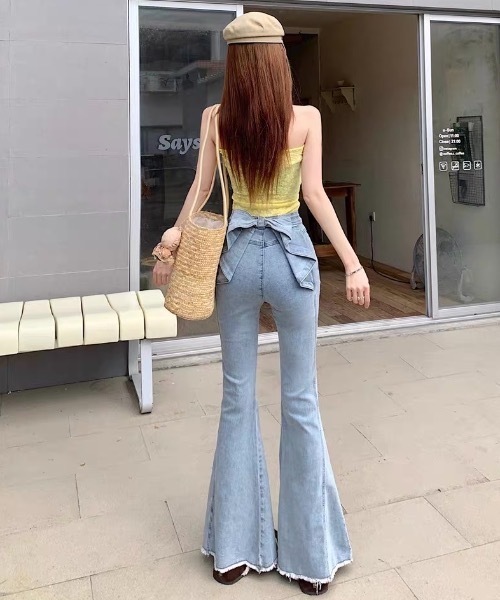 FUNdaysion(ファンデイション)の「バックリボンフレアデニムパンツ(デニムパンツ・レディース・サックスブルー・S/M/L)」の15枚目の写真