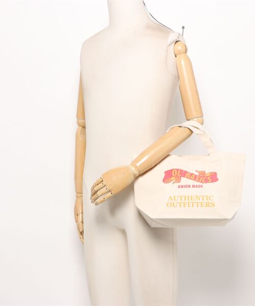 Ol' Basics（オールベーシックス）の「Ol' Basics（オール・ベーシックス） トートバッグ キャンバス リボンイラスト ロゴ プリント 鞄 BAG アメカジ メンズ レディース ユニセックス SMサイズ（トートバッグ・レディース・ベージュ系1/ベージュ系2・FREE）」の7枚目の写真