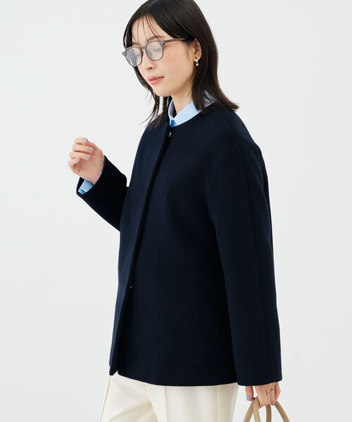 NOLLEY’S Sophi(ノーリーズソフィ)の「アンゴラビーバーノーカラーショートコート(ノーカラーコート・レディース・ネイビー/ライトグレー・38/36)」の11枚目の写真