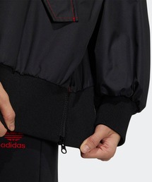 adidas（アディダス）の「CNY パッチ ボンバージャケット