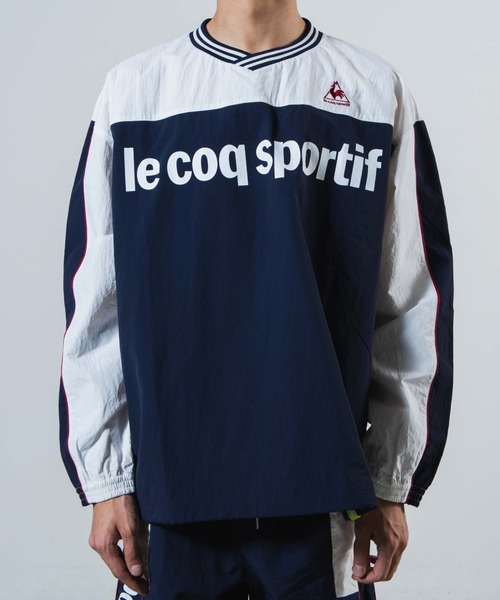le coq sportif（ルコックスポルティフ）の「∴WEGO/別注le coq sportifナイロンプルオーバー（スウェット・メンズ・ネイビー・MEDIUM/LARGE）」の3枚目の写真