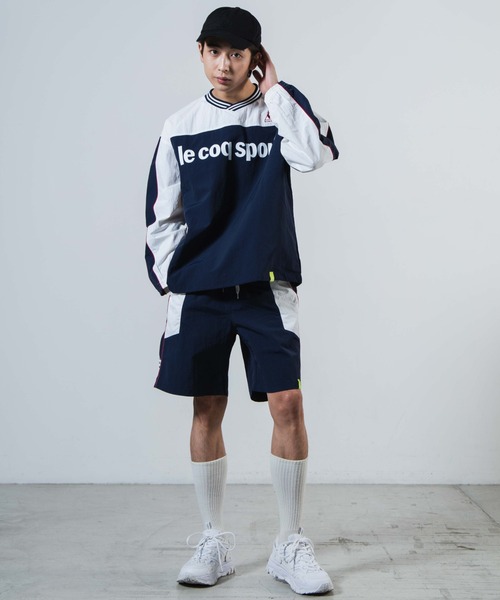 le coq sportif（ルコックスポルティフ）の「∴WEGO/別注le coq sportifナイロンプルオーバー（スウェット・メンズ・ネイビー・MEDIUM/LARGE）」の6枚目の写真