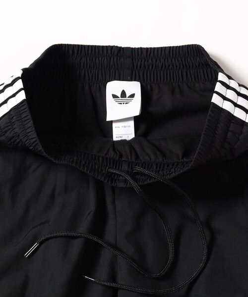 adidas(アディダス)の「adidas / ファイヤーバード ウーブン トラックパンツ(その他パンツ・メンズ・ブラック・X-LARGE/LARGE/MEDIUM/SMALL)」の4枚目の写真