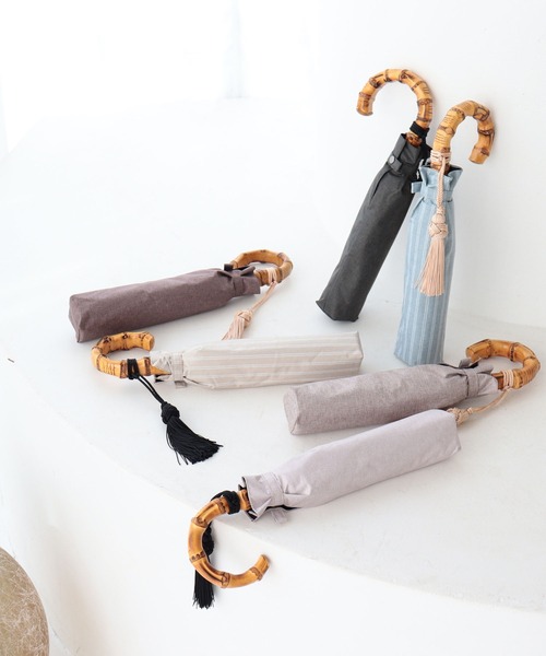 utatane（ウタタネ）の「折りたたみ日傘 完全遮光100％ 晴雨兼用 竹ハンドル シャンブレー（折りたたみ傘・レディース・スモークピンク/アッシュブラウン/スミクロ/モカ・FREE）」の5枚目の写真