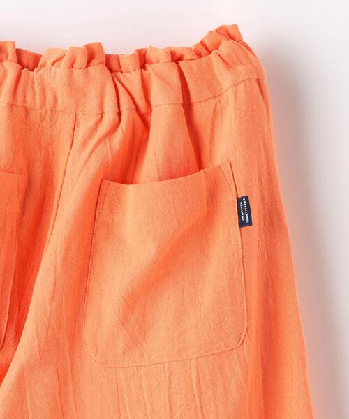 green label relaxing（グリーンレーベルリラクシング）の「TJ ハイウエスト カラーパンツ 2 110cm-130cm（その他パンツ・キッズ・オレンジ/オフホワイト・XS110/S130）」の3枚目の写真