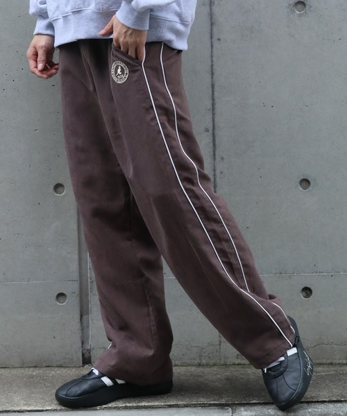 KANGOL(カンゴール)の「【KANGOL/カンゴール】ピーチスキン パイピング トラックパンツ(その他パンツ・メンズ・ブラウン/ブラック/グリーン/ネイビー・M/XL/L)」の1枚目の写真
