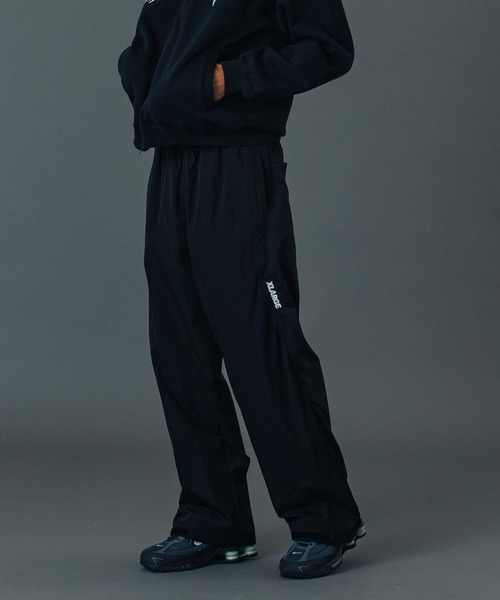 XLARGE(エクストララージ)の「NYLON TRACK PANTS(その他パンツ・メンズ・ブラック/オリーブ/グレー・S/XL/L/M)」の2枚目の写真
