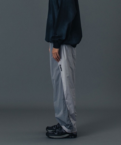 XLARGE(エクストララージ)の「NYLON TRACK PANTS(その他パンツ・メンズ・ブラック/オリーブ/グレー・S/XL/L/M)」の18枚目の写真
