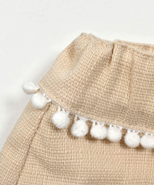 BeBe Petits Pois Vert(ベベプチポワヴェール)の「【店舗限定】無地ツイードポンポンつきキュロット(95~150cm)(その他パンツ・キッズ・ネイビー/ベージュ・120cm/130cm/140cm/100cm/150cm/110cm/95cm)」の5枚目の写真