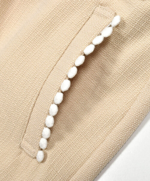 BeBe Petits Pois Vert(ベベプチポワヴェール)の「【店舗限定】無地ツイードポンポンつきキュロット(95~150cm)(その他パンツ・キッズ・ネイビー/ベージュ・120cm/130cm/140cm/100cm/150cm/110cm/95cm)」の7枚目の写真